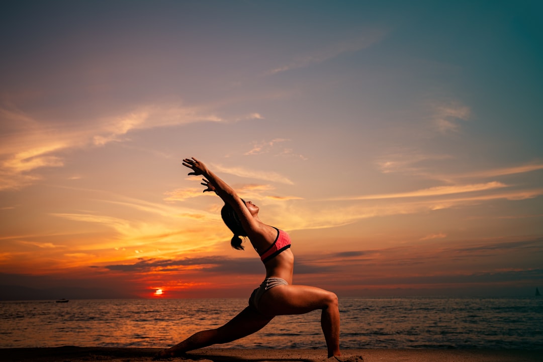 portfolio-01 A beautiful posture of yoga with a sunset behind