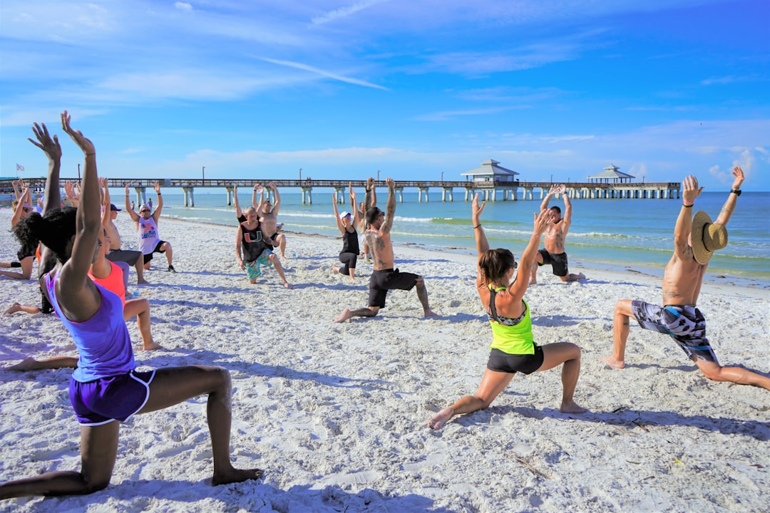 why-choose-us Yoga Workout On The Beach With Group